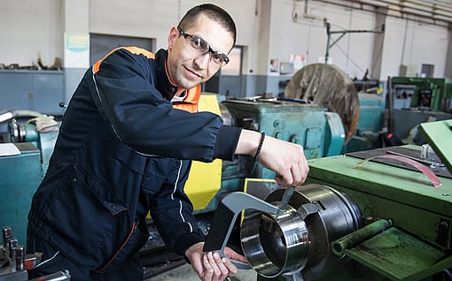 Male production worker looking into the camera